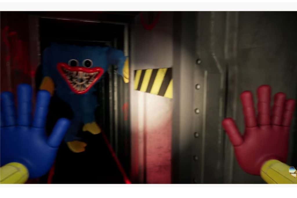Kuva YouTubesta ja pelistä Poppy Playtime, jossa on sininen hirviö Huggy Wuggy.